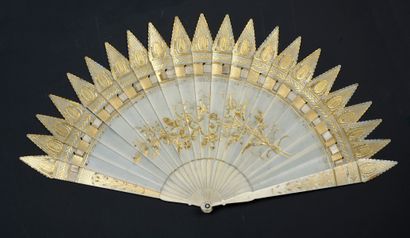 null Two fans, circa 1820
One, of the broken ivory type, painted with a gilt decoration....