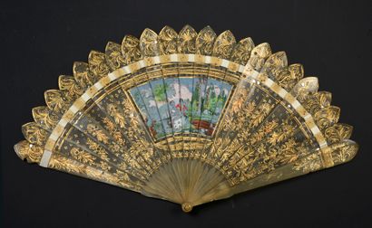  Two fans, circa 1820 One, of the broken ivory type, painted with a gilt decoration....