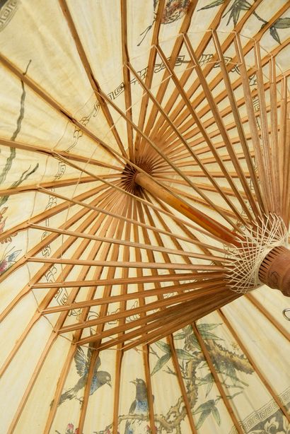  Two umbrellas, China, 20th century Traditional, in painted paper. Bamboo handle....