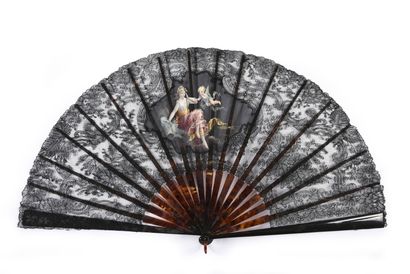 null Confidence, circa 1890-1900
Folded fan, the leaf in black bobbin lace with flowers,...