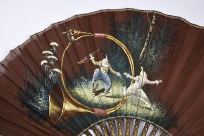 null E. Albert, The Clown and the Hunter Rabbit, ca. 1890
Folded fan, the chocolate-coloured...