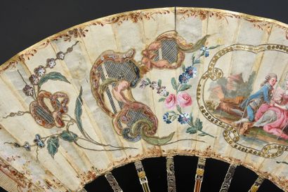 null Straw marquetry, circa 1770-1780
Folded fan, cream silk sheet painted with a...