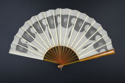null Silver laurels, circa 1900
Folded fan, the leaf in cream tulle and silk, embroidered...