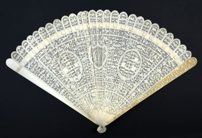  Pagodas, China, 18th century A large and delicate broken fan in ivory*, very finely...
