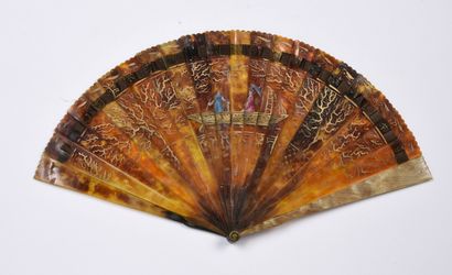 null Chinese pagodas, circa 1820
A broken horn fan with gilt decoration of three...