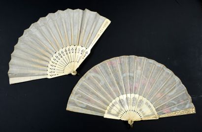  Dreamer with flowers, circa 1900 Folded fan, the leaf painted with blue scrolls...