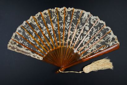  Foliage and flowers, circa 1900 Fan, the tulle leaf decorated with bobbin lace....