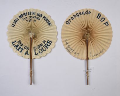 null 
Two fans opening in the sun, one for the orangeade Bop decorated with two riders...