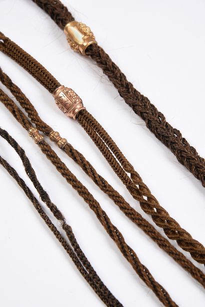 null Four jewels made of braided hair, second half of the 19th century, chestnut...