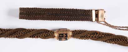 null Two chestnut braided hair jewels, second half of the 19th century, watch chain...