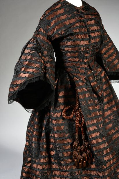 null Daytime dress, circa 1850, black silk and chocolate dress with a beautiful design...