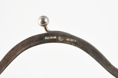 null Evening reticle, circa 1920-1930, silver plated metal clasp in the shape of...