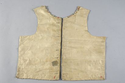 null In front of a square waistcoat, end of the 18th century, large cream-colored...