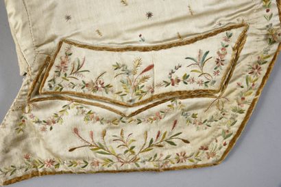 null Basque waistcoat, Louis XVI period, ivory silk satin embroidered with polychrome...