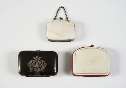null Three small rigid wallets, last third of the 19th century, one sheathed in goatskin...