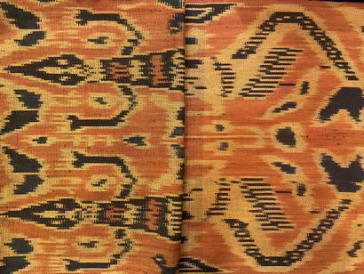 null Sarong, Indonesia, ikat of rust, straw and black cotton with crocodile and stylized...