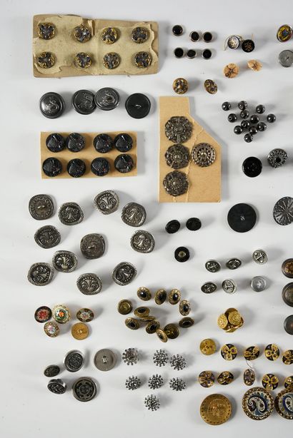 null A combination of metal and glass buttons, mainly from the 19th century, buttons...