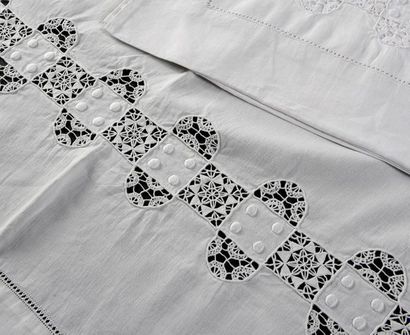 null Set of bed linen and two pillowcases, early 20th century.
A bed linen set in...