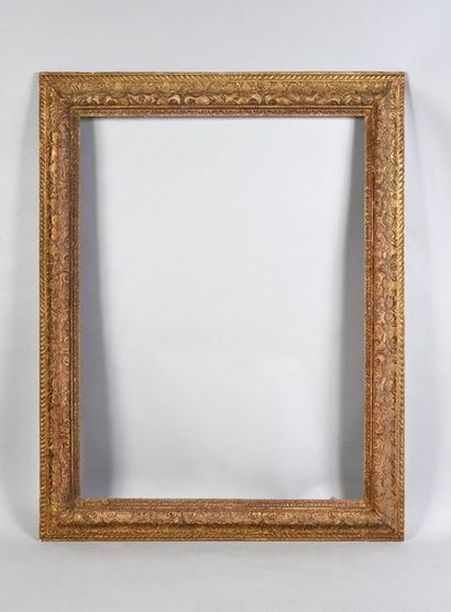 null Beautiful carved and gilded oak frame with an upside down profile and rich Bérain...