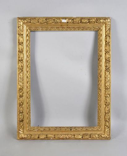null Carved and gilded wooden frame decorated with friezes of laurel leaves.

Louis...
