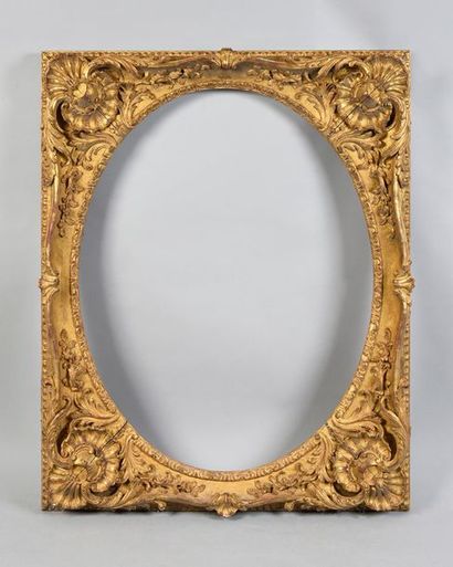 null Beautiful oval oval oak frame with rockery and openwork decoration of acanthus...