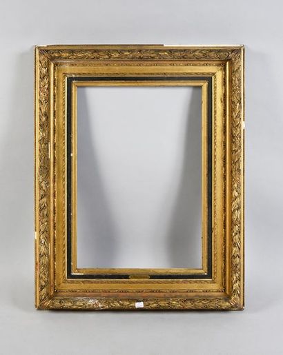 null Wooden frame with gilded and blackened stucco decorated with friezes of ribbons,...