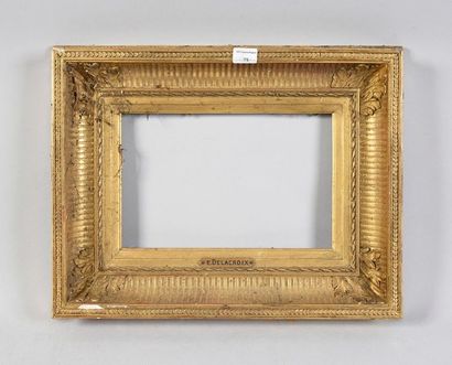 null Wooden frame and gilded stucco called "with channels", carries a "Delacroix"...
