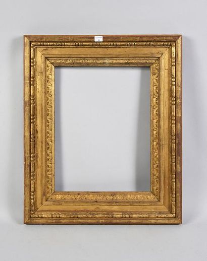 null Carved wood frame formerly gilded from the Louis XVI period (recut).
 31 x 39...