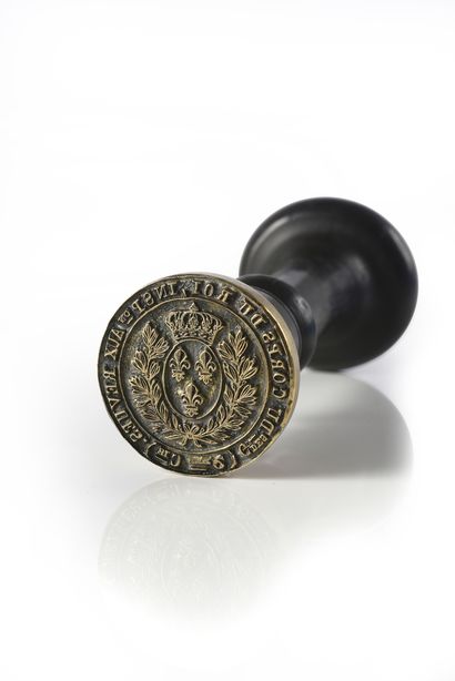 null INK STAMP. 
 Engraved in the centre with the arms of France under a royal crown...