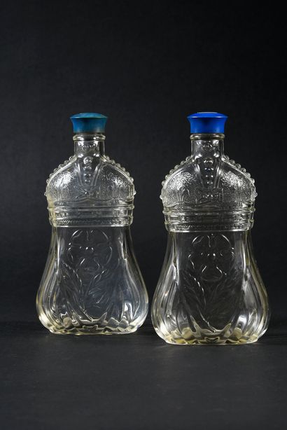 null GEORGE V, King of Great Britain (1865-1936). 
 Set of two moulded glass bottles...