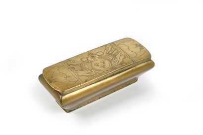 TOBACCO BOX. Rectangular gilt brass box,...