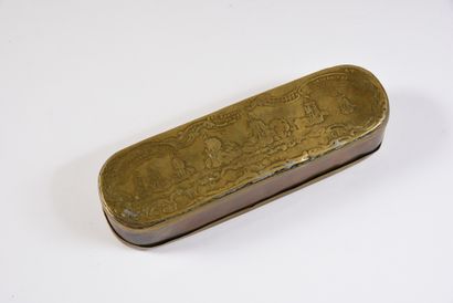 null LARGE TABATIERE.
In gilt brass, oval shape, hinged lid with battle decoration,...