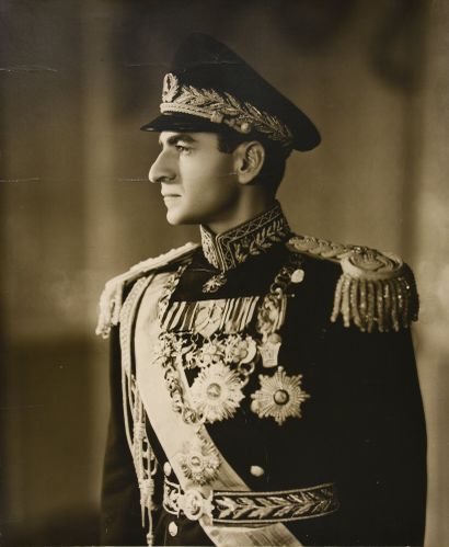MOHAMMAD REZA, Shah d'Iran (1919-1980). Large photographic portrait of him, posing...