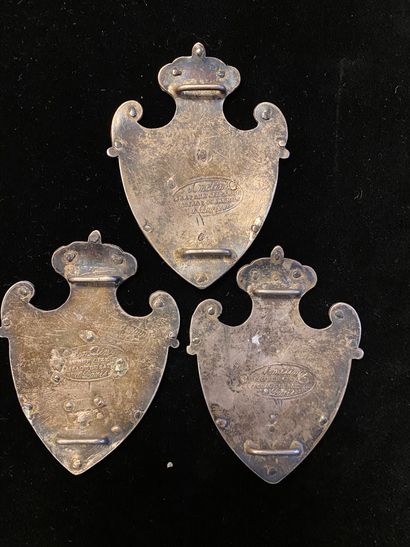 null SET OF THREE POSTILLON PLATES.
In the form of a coat of arms surmounted by a...