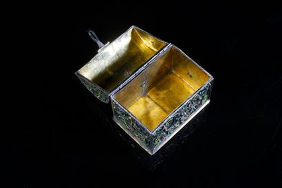 null Silver-gilt, filigree and enamelled silver box, the domed lid resting on four...