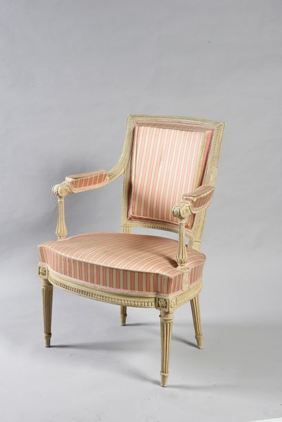 null Cabriolet armchair in moulded wood, carved with friezes of water leaves and...