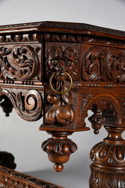 null Important carved oak table with floral scrolls and grotesque figures, the base...