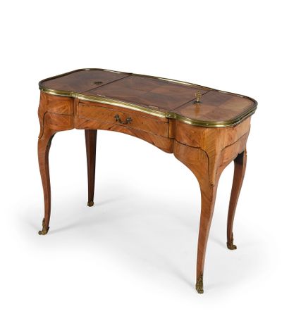 null Birthing table in rosewood and violet wood veneer, the top decorated with a...