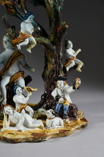 ALLEMAGNE ?, XVIIIe siècle 
Groupe en faïence représentant Orphée assis sur un tronc...
