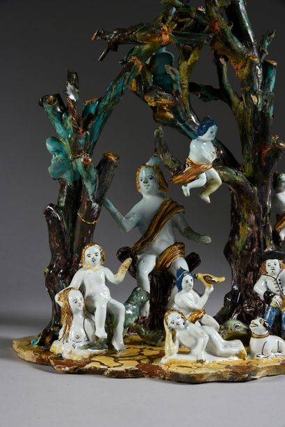 ALLEMAGNE ?, XVIIIe siècle Groupe en faïence représentant Orphée assis sur un tronc...