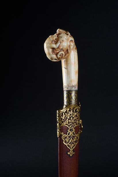 null Ivory Indian kard dagger carved in the shape of an elephant's head attacked...