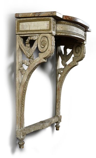 null Pair of carved and grey lacquered oak wall light consoles, they rest on two...