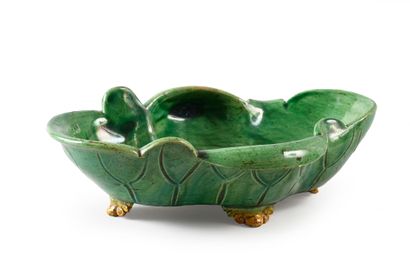 null Large green and yellow enamelled lotus dish. (restorations). 
 China Qing Dynasty,...