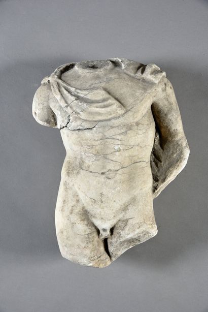 null Bust of a marble statue probably representing Apollo holding his lyre, the draping...