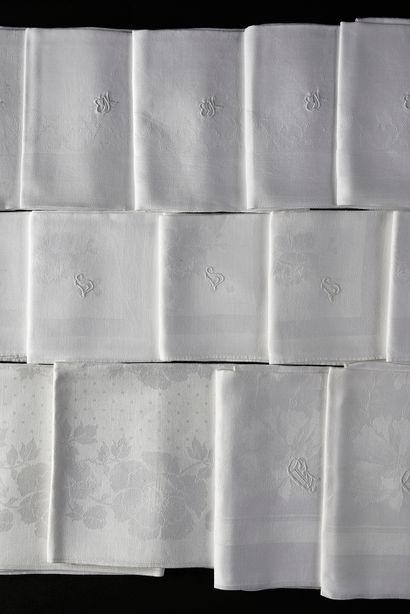 Suites of damask napkins, early 20th century.
A...