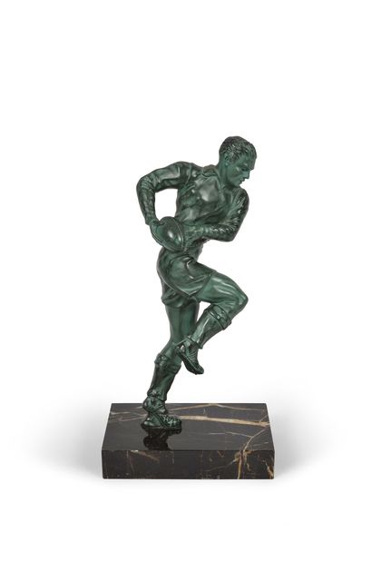 null Sculpture in regula on a marble base. "The Rugbyman". Around 1950. Green patina.
Total...