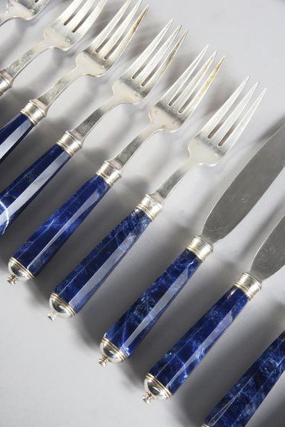 E. PETER Part of service in silver 925e and sodalite.
6 forks, 6 knives, a spoon...