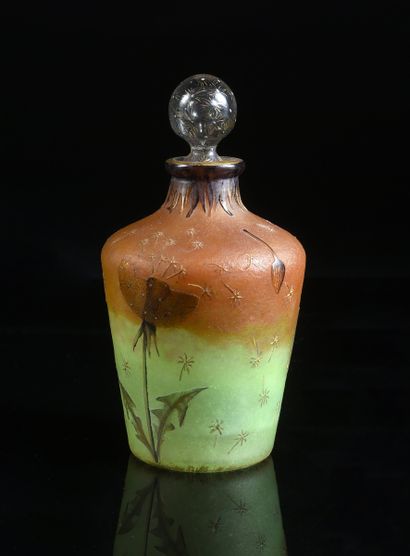 DAUM à Nancy 
Bottle with dandelion decoration.
Glass proof with acid-etched and...