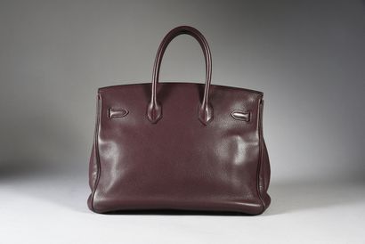 HERMES BIRKIN bag 40 cm in Togo Raisin calf, gold plated metal trim, pull tab, bell,...