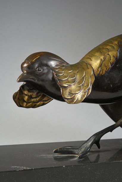 Georges H. LAURENT (XIXe - XXe siècle) 
Gilded pheasant. 
Bronze with a brown and...